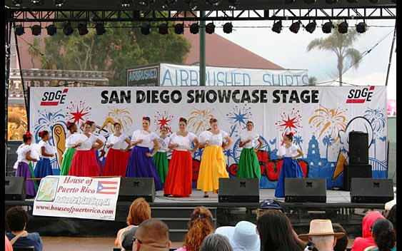 Fairgoers enjoying some Puerto Rican culture. San Diego County Fair, Del Mar