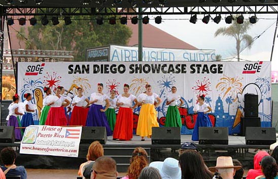 Fairgoers enjoying some Puerto Rican culture. San Diego County Fair, Del Mar