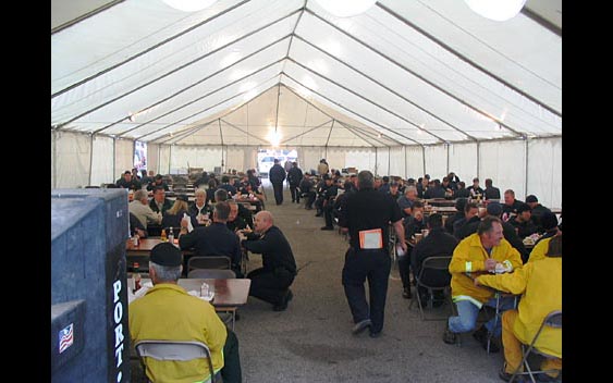 Fire fighters refueling with a hearty meal in the dining tent. Santa Barbara Fair & Exposition, Santa Barbara