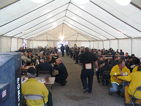 Fire fighters refueling with a hearty meal in the dining tent. Santa Barbara Fair & Exposition, Santa Barbara