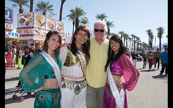Huell Howser with 2010's Queen Scheherazade and Princesses. Riverside County Fair & National Date Festival, Indio