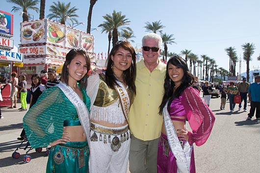 Huell Howser with 2010's Queen Scheherazade and Princesses. Riverside County Fair & National Date Festival, Indio