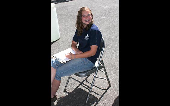 A friendly volunteer greeting fairgoers. Calaveras County Fair, Angels Camp