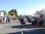 People walking around the Merced County Fair