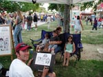 Artist drawing a family caricature