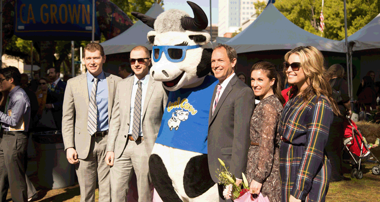 Costume character cow with ag day guests