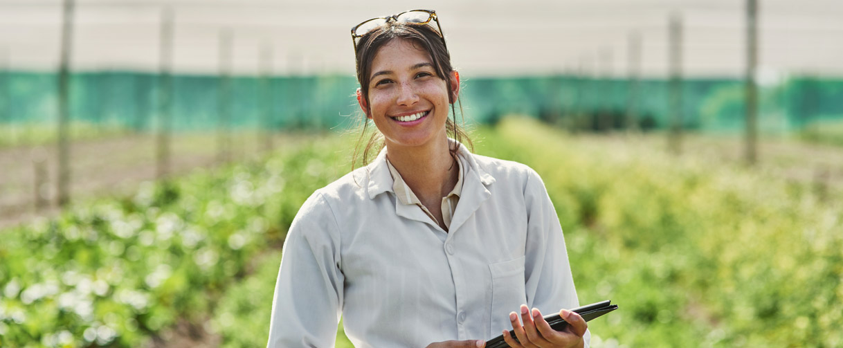 A farmer smiling