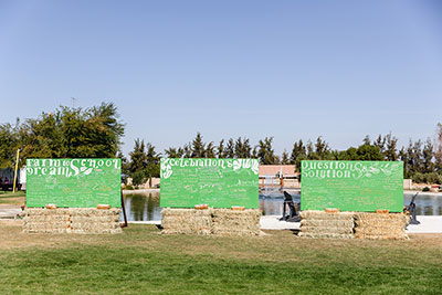 Three green handpainted billboards