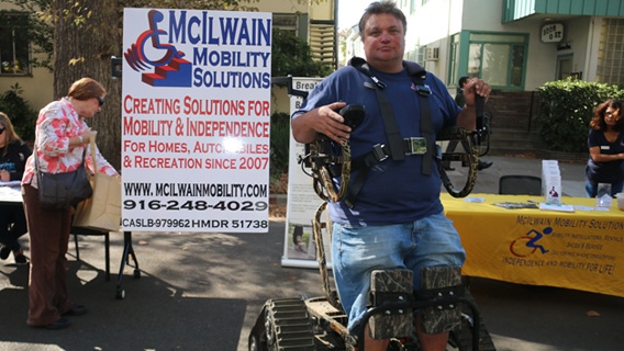 McIlwain Mobility Solutions display with all terrain piece of equipment.