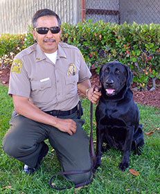 Handler Rogelio Carranza  and Detection Dog Tahoe