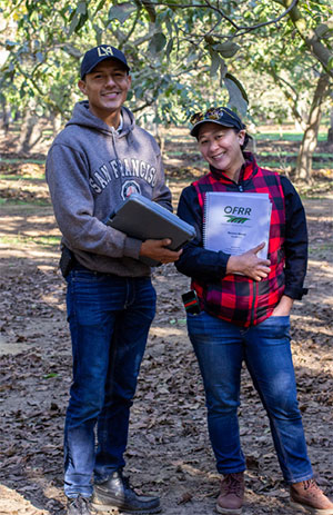 CDFA inspectors in an orchard