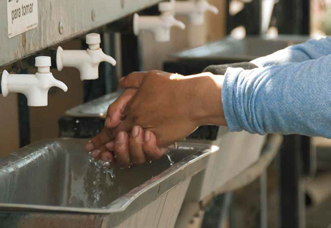 Person washing hands