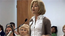 Woman speaking at the meeting